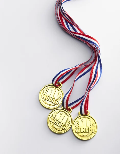 Medalhas de ouro com fita — Fotografia de Stock