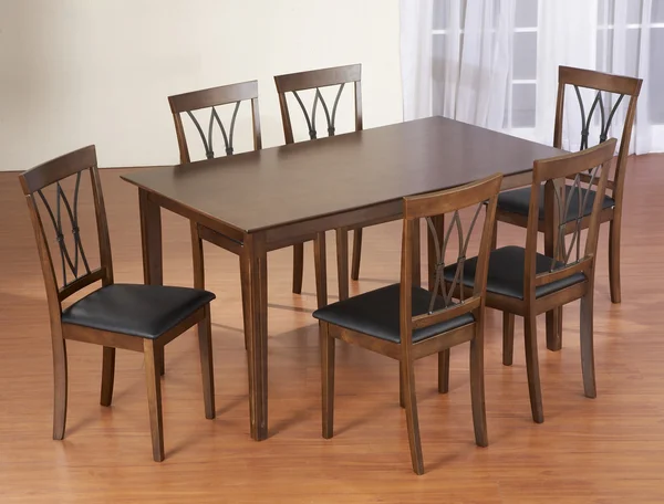 Dinner table with chairs — Stock Photo, Image