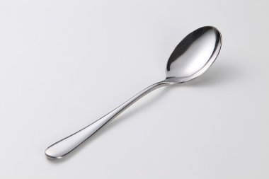Gümüş kaşık izole