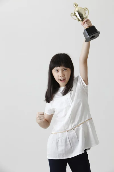 Girl holding  trophy — Stock Photo, Image