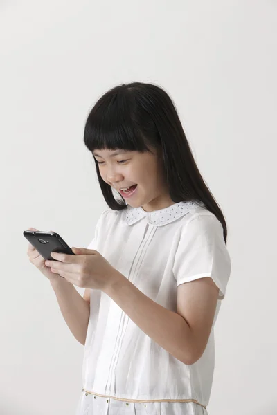 Chinesisches Mädchen am Telefon — Stockfoto