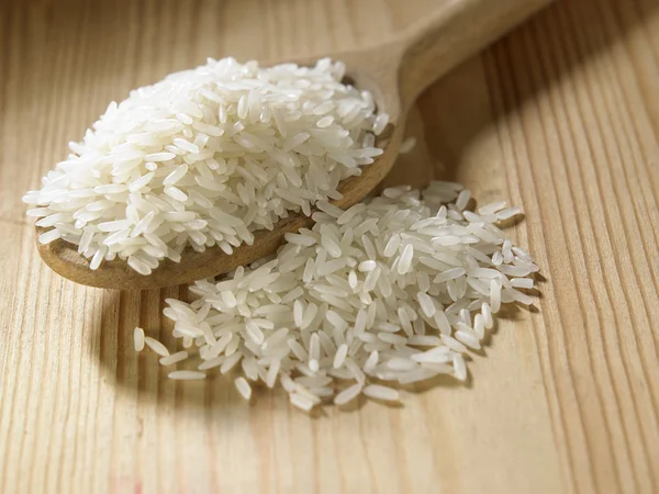 Spoon full of rice — Stock Photo, Image