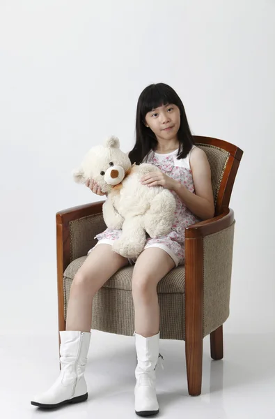 Girl holding teddy bear — Stock Photo, Image