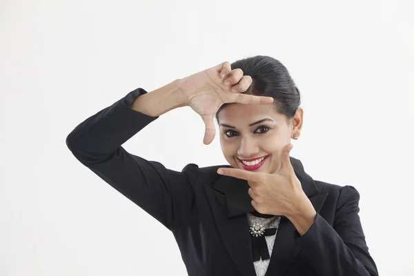 Indian female with hand frame — Stock Photo, Image