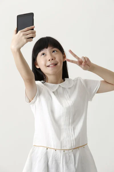 Chinees meisje maken selfie — Stockfoto
