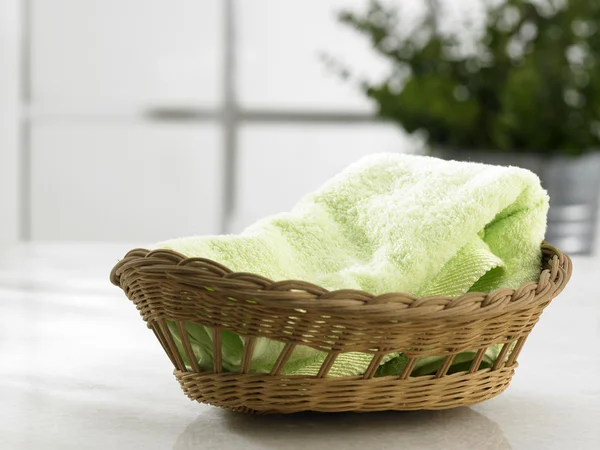 Hand towel in the basket — Stock Photo, Image