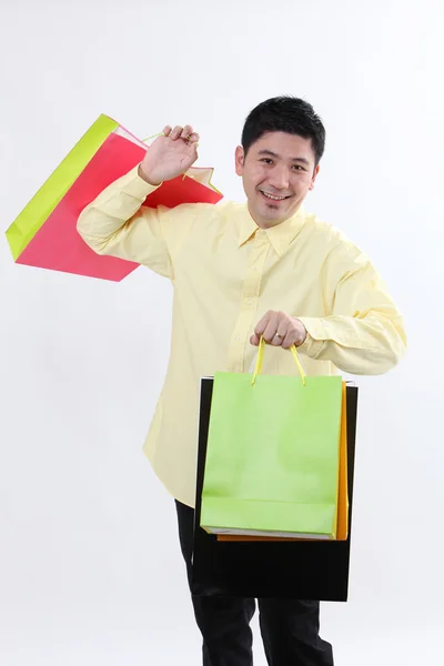 Hombre con bolsas de compras —  Fotos de Stock