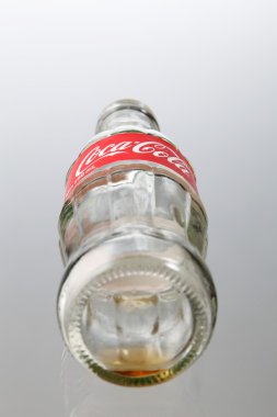 empty bottle of coca cola