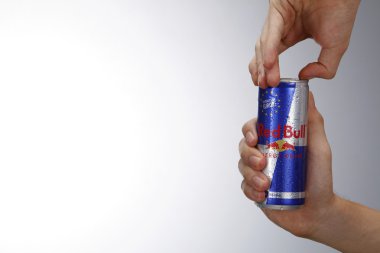 Man opening can of redbull clipart