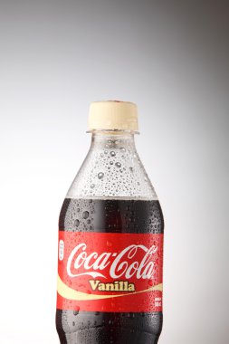 A bottle of Coca Cola drinks