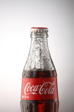 A bottle of Coca Cola drinks