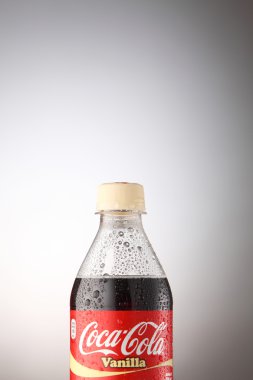 A bottle of Coca Cola drinks