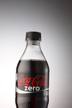 A bottle of Coca Cola drinks