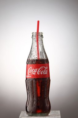 A bottle of Coca Cola drinks