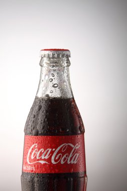 A bottle of Coca Cola drinks