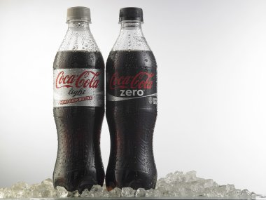Coca-cola bottles on white background
