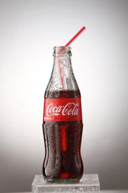 A bottle of Coca Cola drinks