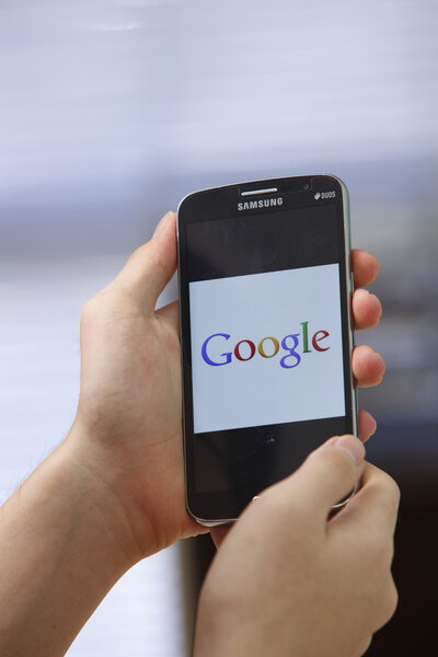 Phone with runnig app in hands