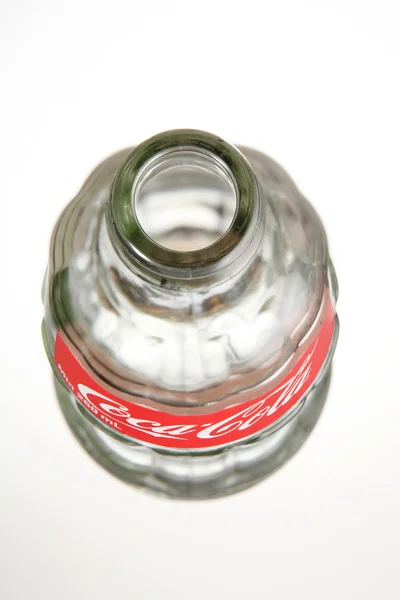 Empty bottle of coca cola — Stock Photo, Image