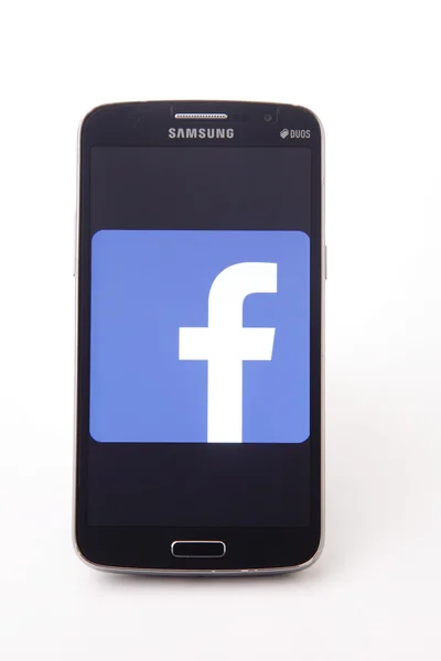 Mobile phone with logo — Stockfoto