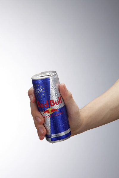 hand holding redbull
