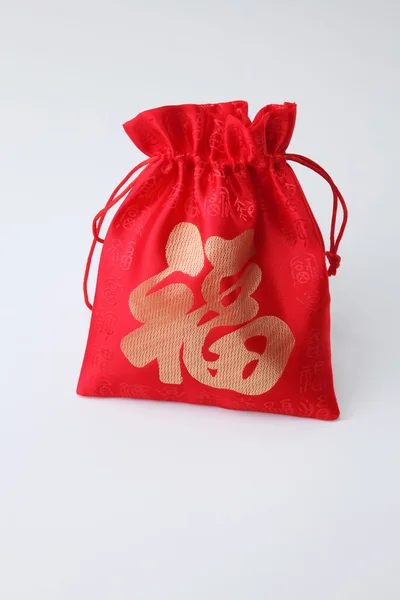 Czerwony szczęśliwy torba — Zdjęcie stockowe