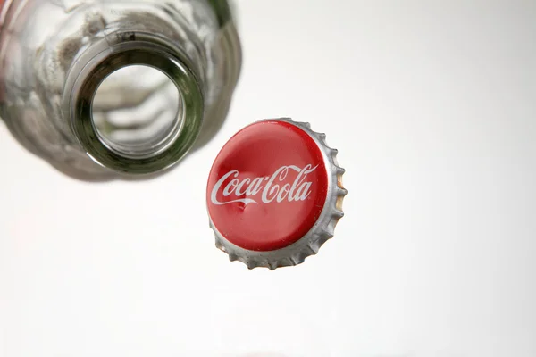 Empty bottle of coca cola — Stock fotografie