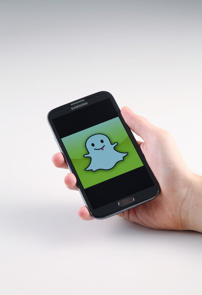 Human hand with phone