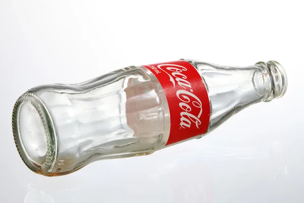 Empty bottle of coca cola — Stockfoto