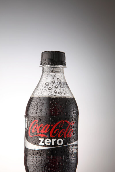 A bottle of Coca Cola drinks