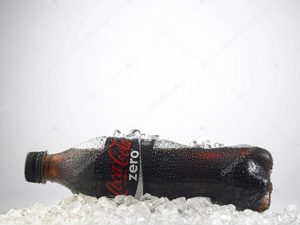 KUALA LUMPUR, MALAYSIA,  MARCH 24, 2015: Photo of a bottle of Coca-Cola bottle. The brand is one of the most popular soda products in the world and it is sold almost everywhere