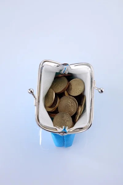 Coins in the blue wallet — Stock Photo, Image