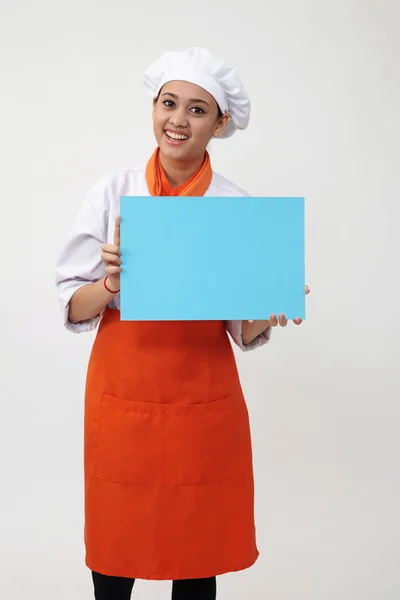 Mujer chef celebración tarjeta —  Fotos de Stock
