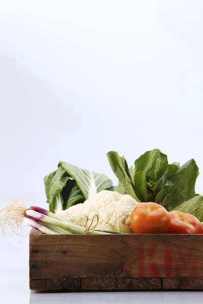 Vegetables in wooden box — Stock Photo, Image