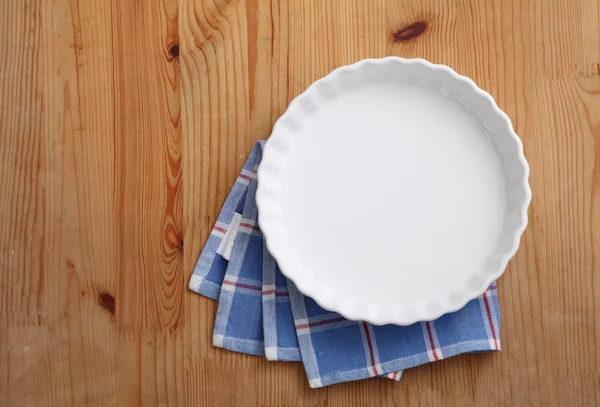 White plate and blue napckin — Stock Photo, Image