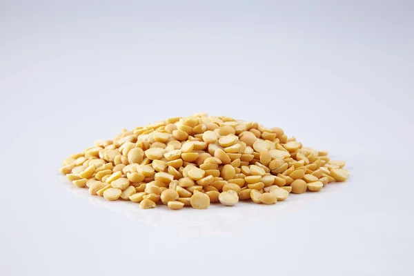 Uncooked yellow lentils — Stock Photo, Image