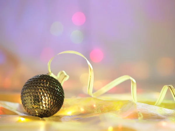 Christmas ball with ribbon — Stock Photo, Image