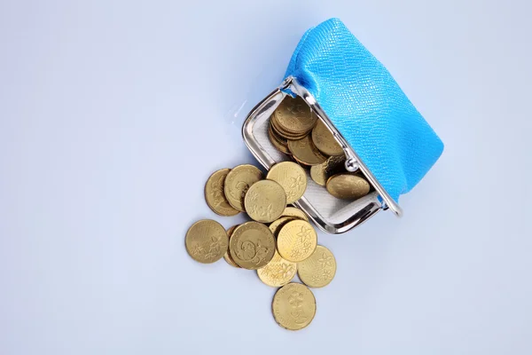 Coins in the blue wallet — Stock Photo, Image