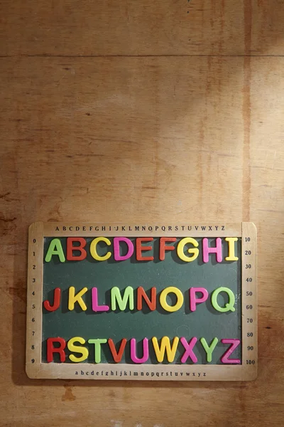 Letras del alfabeto en pizarra — Foto de Stock
