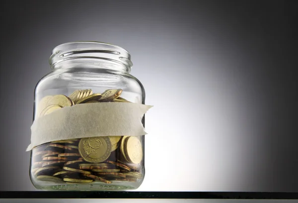 Saving jar with coins — Stock Photo, Image