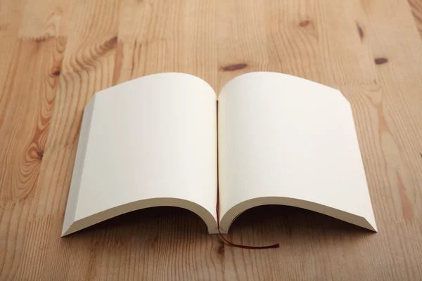 Open book on table — Stock Photo, Image