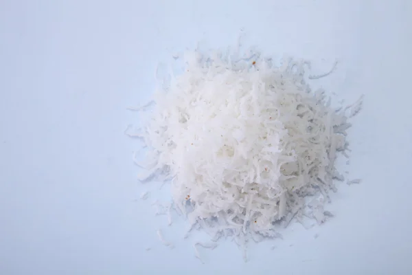 Shredded coconut on table — Stock Photo, Image