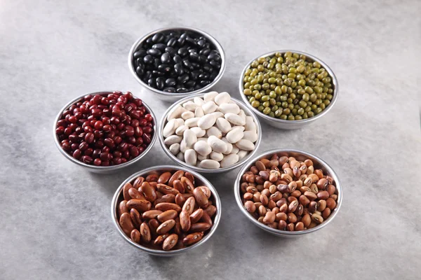 Beans on marble table — Stock Photo, Image