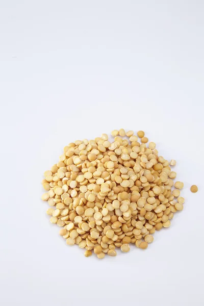 Pilha de lentilhas amarelas — Fotografia de Stock