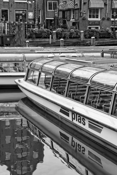 Holland, Amsterdam; 9 October 2011, ferryboats in a canal near the Central Station - EDITORIAL — Stock Photo, Image