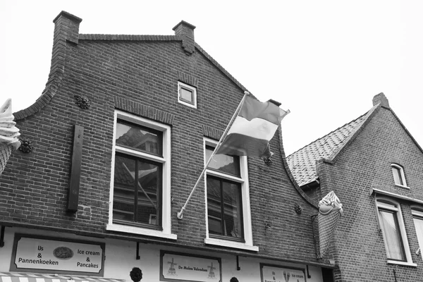 Holland, Volendam (Amsterdã); 9 de outubro de 2011, a fachada das antigas casas de pedra - EDITORIAL — Fotografia de Stock