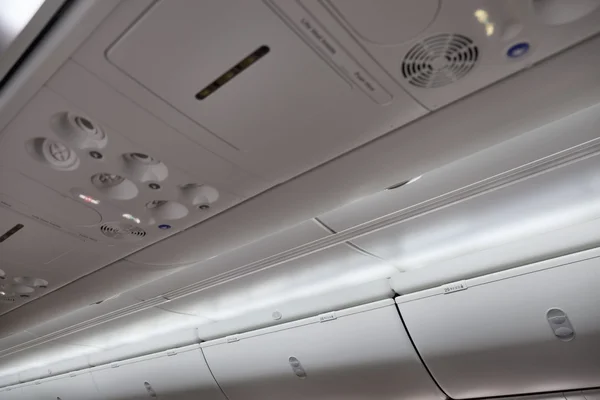 Italy, airplane cabin with no smoking sign on — Stock Photo, Image