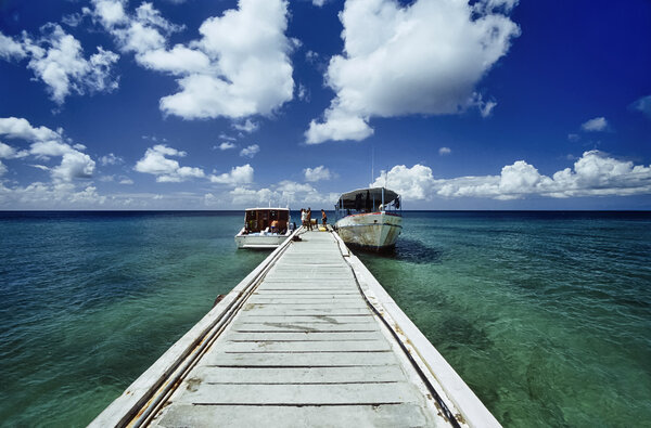 CUBA, Maria La Gorda beach, old cuban diving boats and a wooden jetty - FILM SCAN