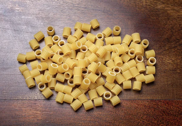 Food Uncooked Italian Small Ribbed Tubes Pasta Wooden Table — Stock Photo, Image