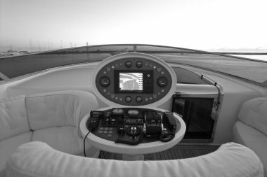 Italy, Fiumicino (Rome); 15 September 2005, MAIORA luxury yacht in the port, view of the flybridge and the cockpit at sunset - EDITORIAL